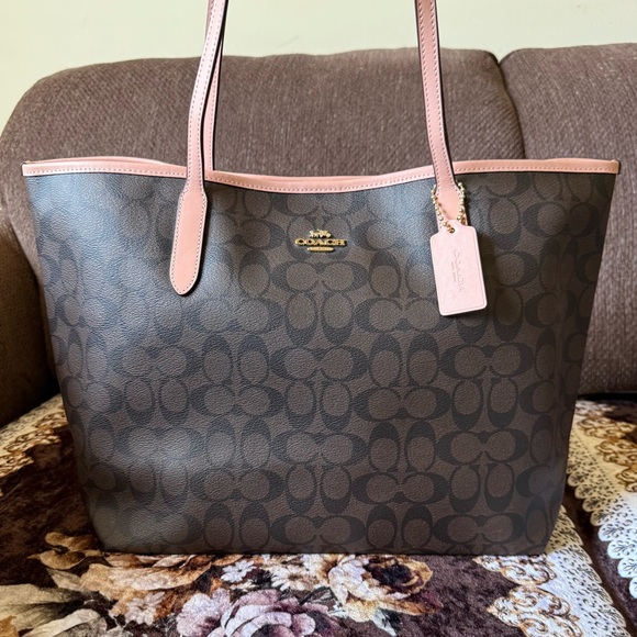 Coach Handbags - COACH Brown/Pink Signature Coated Canvas Gold-Tone Hardware City Tote Bag